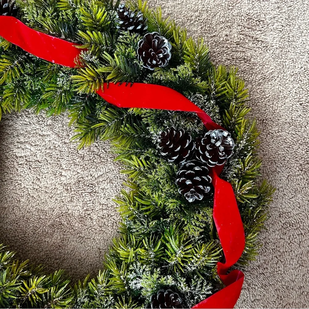 Elegant Artificial Green Christmas Holiday Wreath with Red Ribbon and Pinecones